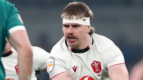 Aaron Wainwright set to pass the ball for Wales against Ireland