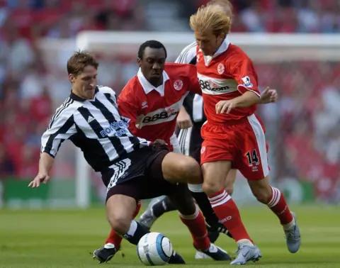 Getty Images Gaizka Mendieta of Middlesbrough clashes with Robert Elliott of Newcastle