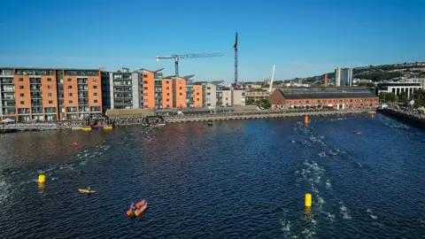 Getty Images An aerial view of the swim start of IRONMAN 70.3 Swansea which is the first Pro Series race to be held in the UK on July 13, 2025 in Swansea, Wales.
