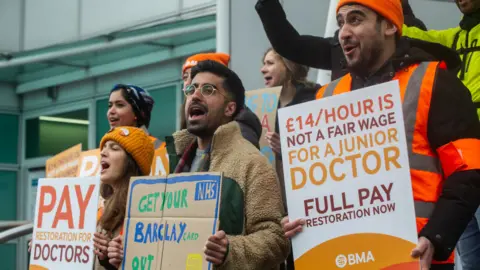 Getty Images Junior Doctors attend their picket line at UCH on April 14, 2023 in London, England