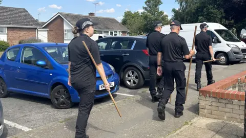 Alice Cunningham/BBC Police in Brantham during investigations