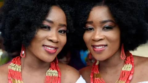 A pair of twins pictured in Igbo-Ora, Nigeria in 2019