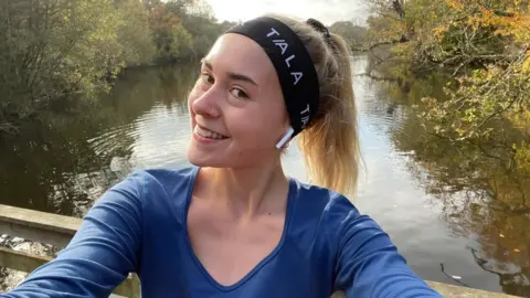 Isabella Clark Isabella posing for a selfie by a river