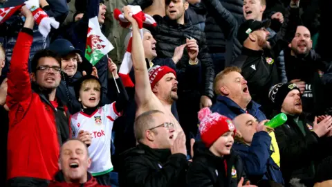 Barrington Coombs/PA Wire Wrexham fans celebrate