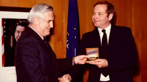 CIA handout Edward Johnson receiving the intelligence star from John N McMahon, the Agency’s deputy director for operations at the time