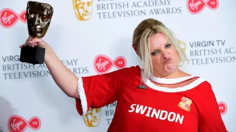 PA Daisy May Cooper with the award for Scripted Comedy for "This Country"