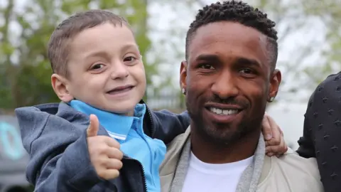 PA Bradley Lowery and Jermain Defoe