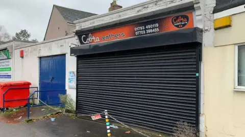 LDRS Photo of exterior of Cobra Leather shop