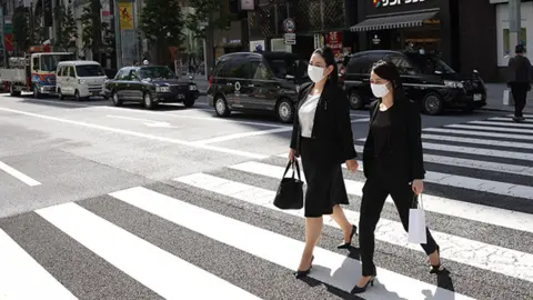 Getty Images Japanese business women in Tokyo's central business district