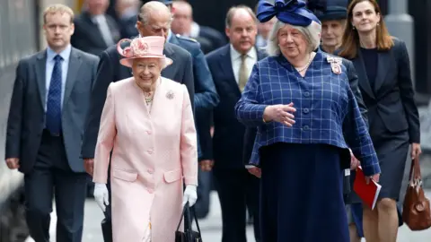 Getty Images Dame Lorna Muirhead with the Queen