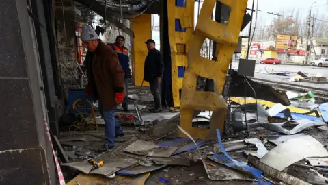 Reuters Damaged building in Kherson