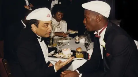 Sonny Vaccaro (left), Deloris Jordan and Michael Jordan.