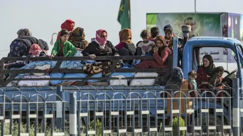 AFP/Getty Images Syrian families fleeing