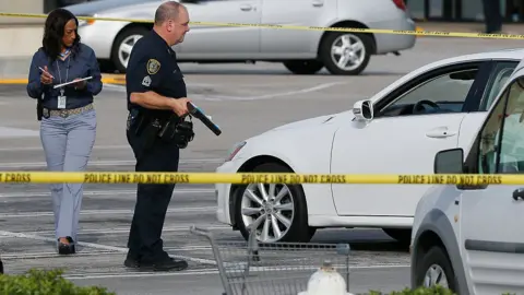 Getty Images Police respond to a mall shooting near Dallas, Texas
