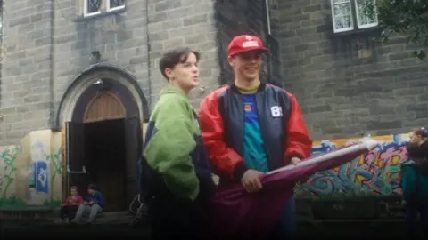 Declan Donnelly as Duncan and Anthony McPartlin as Peter PJ Jenkins (aka Ant and Dec) in series four of Byker Grove in 1992 outside The Grove - the location is Benwell Towers in Newcastle upon Tyne