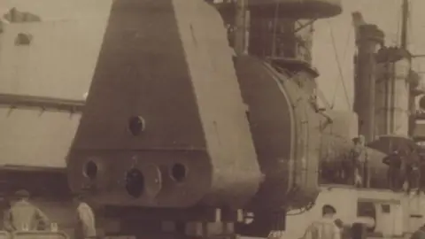 Bobby Forbes Collection Historic image of a warship's spotting top