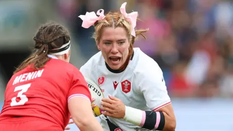 Wales number eight Georgia Evans in action against Canada