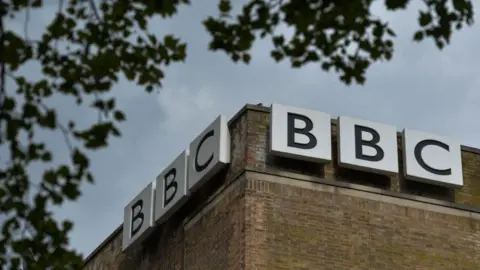 Getty Images BBC branding at the top of the company building on Ormeau Avenue Belfast. The letters are in black against three white square boxes. 