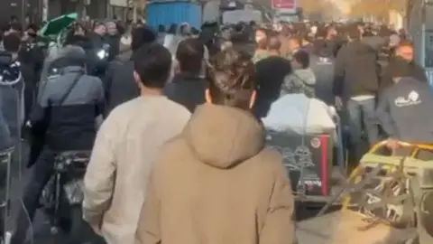 BBC Persian Screengrab of video appearing to show a protest on Tehran's Cheragh Barq street in Tehran, Iran (5 January 2025)