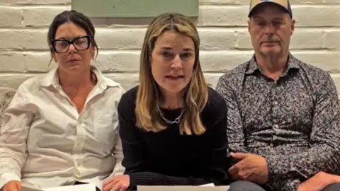 Savannah Guthrie (centre) and family members issue their plea