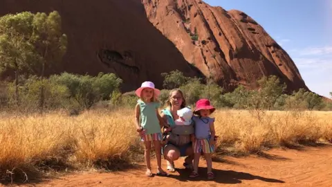 Nicola Kinloch with daughters Freya, Ariya and Ella at Ayers Rock