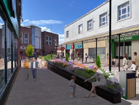 Cumberland Council An artist's impression of Workington public realm improvements. A white stone street has a long flower bed running down the middle of it. A veranda is superimposed above the shop front.