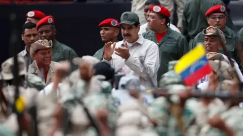 Reuters Venezuela's President Nicolás Maduro takes part in a ceremony to mark the 17th anniversary of the return to power of late President Hugo Chávez after a coup attempt and the National Militia Day in Caracas, Venezuela April 13, 2019