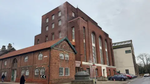 George King/BBC A landscape shot of Westgate Brewery - a large brick building