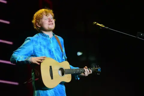 AFP British singer and songwriter Ed Sheeran performs during a concert in Mumbai on November 19, 2017. 