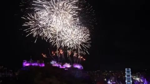 PA Media Fireworks light up the sky over Edinburgh Castle