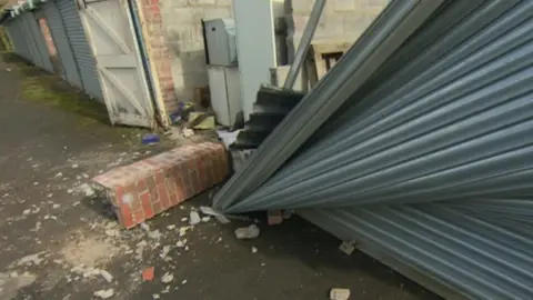 Damaged garages in Pontardawe