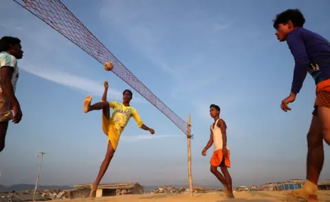 Mohammad Ponir Hossain/Reuters Rohingya refugees play Chinlone