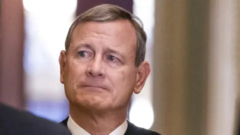 EPA John Roberts walking into the Senate to swear in lawmakers for the impeachment trial of Donald Trump, January 2020
