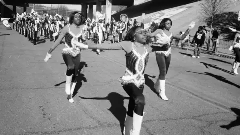 Corbis via Getty Images Bands march in a parade through the Greenwood neighbourhood in February of 2016 in Tulsa, Oklahoma.