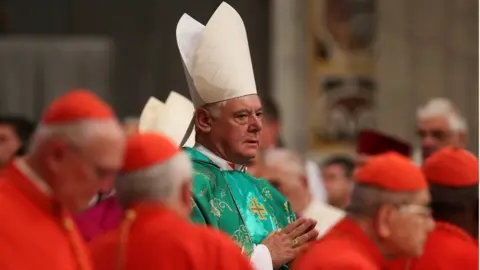 Reuters Newly elected cardinal Gerhard Ludwig Muller of Germany arrives during a consistory ceremony led by Pope Francis in Saint Peter"s Basilica at the Vatican February 22, 2014.