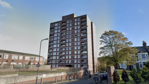 Image of a redbrick tower block where some of Ms Jones' tenants live