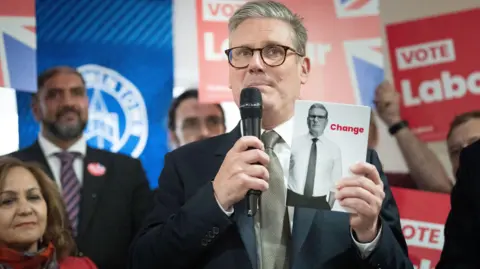 PA Media Keir Starmer speaking to an audience