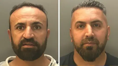 Police mugshot of Dilshad Shamo and Ali Khdir. Shamo is on the left and had a beard and is looking at the camera. Khdir is on the right and is wearing a dark blue t-shirt, he also has a beard.