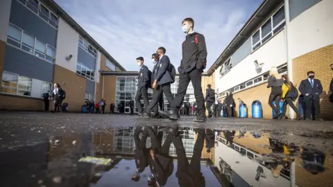 PA Media School pupils arrive at St Andrew's RC Secondary School in Glasgow