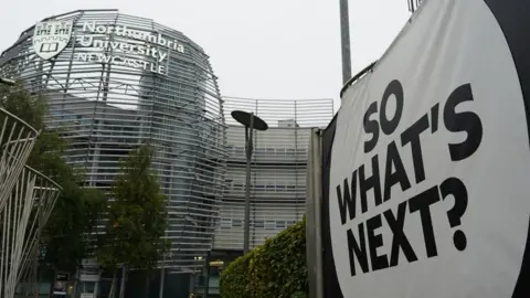 Getty Images Sign in front of university building