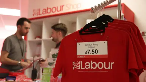 Getty Images Merchandise being sold at Labour conference