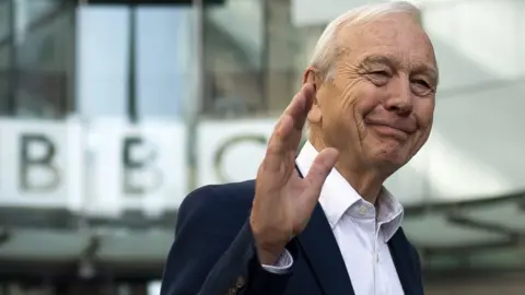 EPA John Humphrys waved goodbye to the BBC on Friday after 32 years