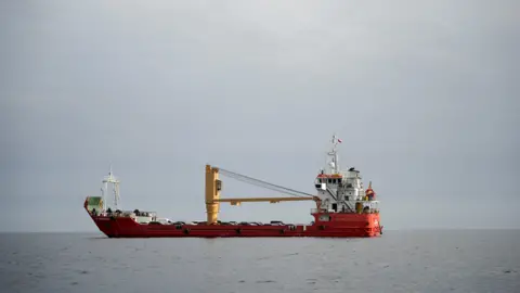 A vessel in the Strait of Hormuz, off the coast of Oman’s Musandam province, on 12 April