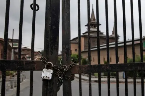 Reuters Jamia Masjid is seen locked during restrictions ahead of Eid-al-Adha after scrapping of the special constitutional status for Kashmir by the government, in Srinagar, August 11, 2019