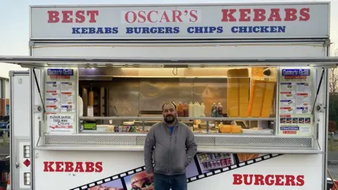 NAZIF YURF outside his kebab van