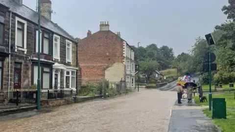 Paul Jones-King Flooding on the street at Loftus