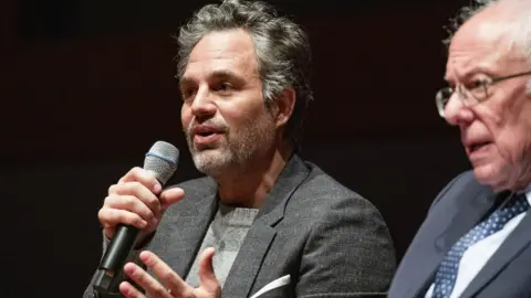 Getty Images Sen. Bernie Sanders and actor Mark Ruffalo (left) participate in a roundtable discussion at the U.S. Capitol on strategies to combat the widespread contamination of America's drinking water on January 29, 2020 in Washington, DC.