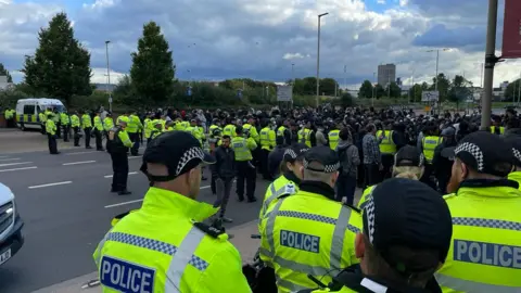 Police facing protesters