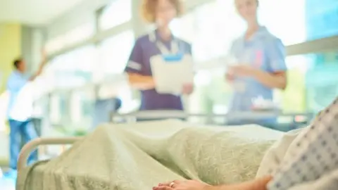 Getty Images Generic women in hospital bed