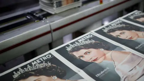 Getty Images A run of newspapers featuring Queen Elizabeth II